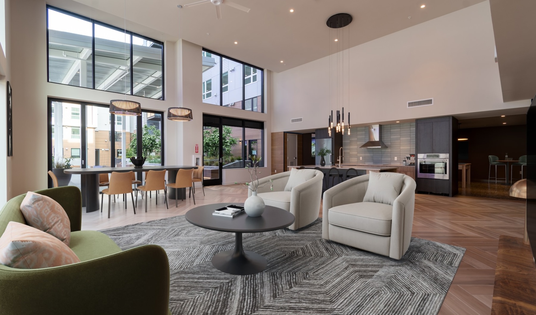 Your new favorite social area clubroom with tables, chairs, and large windows