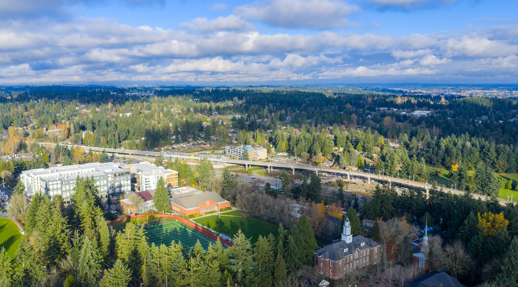 aerial view of neighborhood and property
