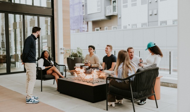 Find your perfect fit at The LINE a group of young adults conversing