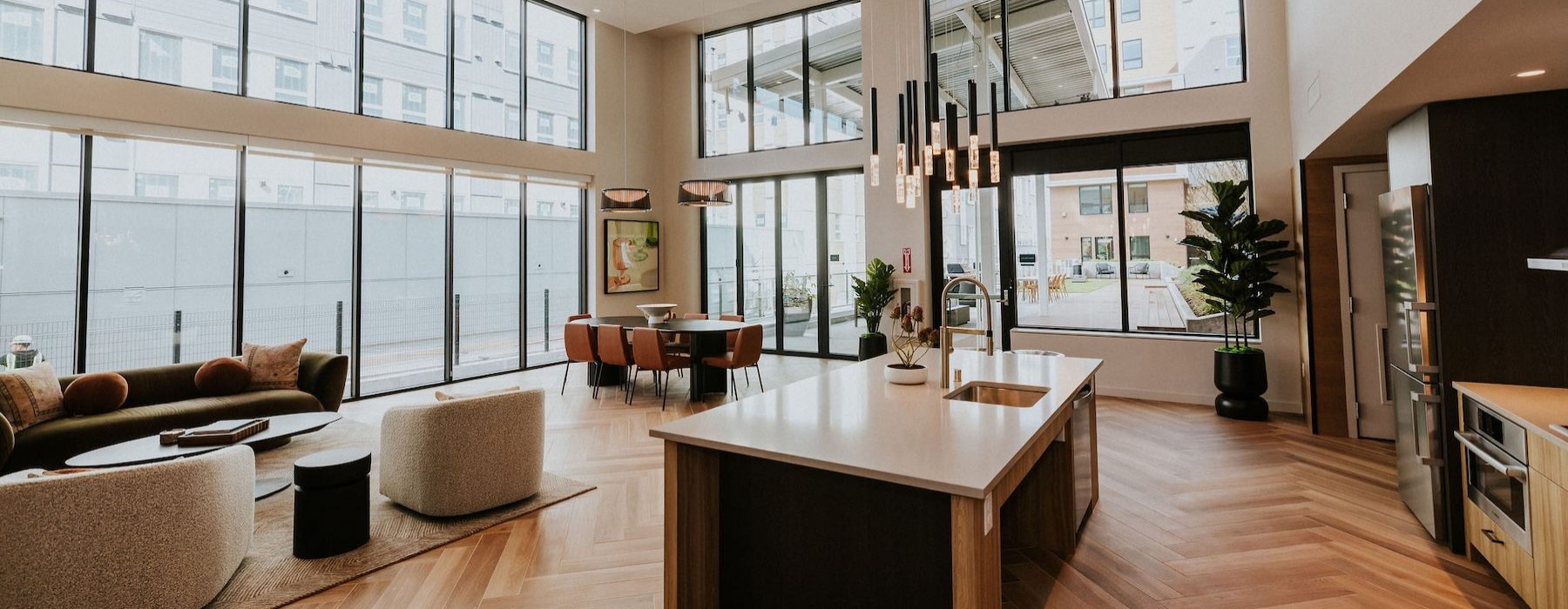 a community kitchen with a couch and chairs
